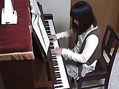The uber-cute young teenage only came to practice her piano skills, and to get some lessons in playing the instrument. Her dirty teacher has other ideas, and looks up her skirt, and runs in rivulets at the view of her knickers. His frigs are briefly findi