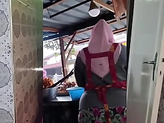 Ginormous Indonesian Milf in hijab takes on a good-sized salami like a pro