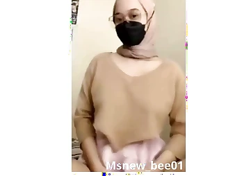 See this hijab-wearing teenager with humungous innate boobies pleasure herself in a insatiable hijab-wearing sesh