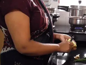 Stepson plows YourDisha's Indian pussy beside the kitchen thither his fat load of shit